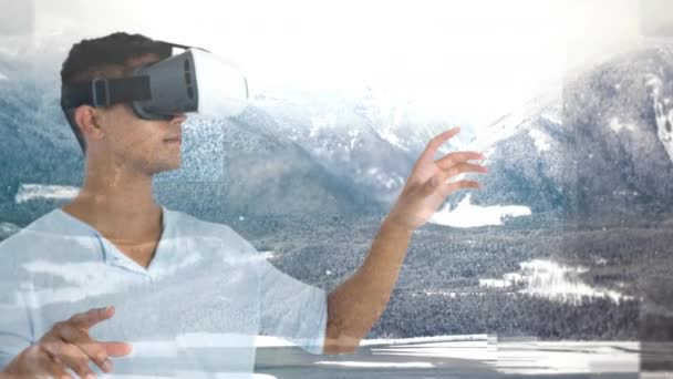 Digital Composite Von Geschäftsmann Mit Headset Vor Schneebedeckten Bergen Hintergrund — Stockvideo