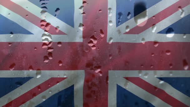 Gotas Lluvia Cayendo Sobre Vidrio Sobre Fondo Bandera Británica — Vídeo de stock