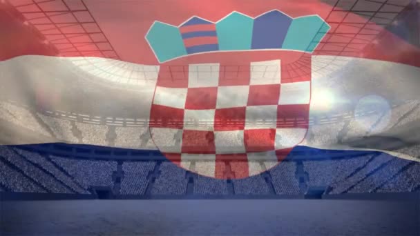 吹在风的克罗地亚旗子与足球场在背景 — 图库视频影像