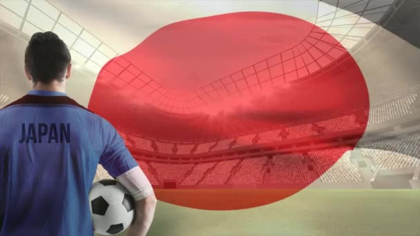 Κινούμενο Ιαπωνική Σημαία Ποδοσφαιριστή Κρατώντας Ποδόσφαιρο Στο Γήπεδο — Αρχείο Βίντεο