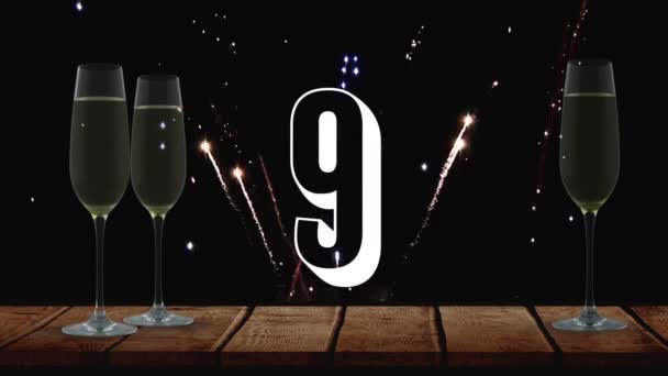 香槟酒眼镜与数字动画背景倒计时和烟花 — 图库视频影像