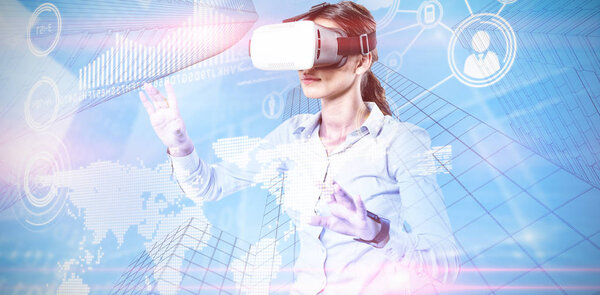 Female executive using virtual reality headset against composite image of technology interface