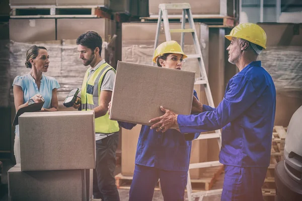 Coworkers Looking Each Other Warehouse — Stock Photo, Image