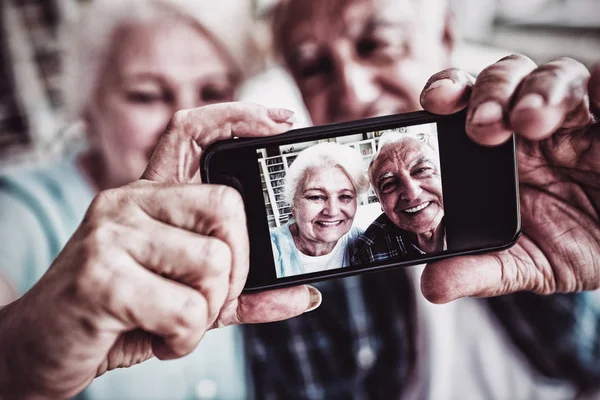 Senior Couple Taking Photo Mobile Phone Home — Stock Photo, Image