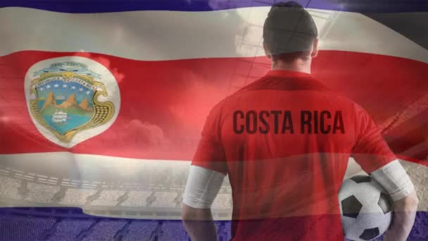 Costaricansk Fotbollsspelare Med Fotboll Bollen Händerna Framför Flaggan Costa Rica — Stockvideo