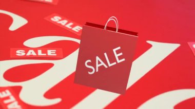 Kırmızı alışveriş çantası kendi etrafında kırmızı satış desen karşı dönüm dijital animasyon