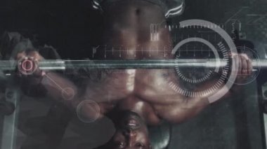 Digital composite of athletic man doing bench press with digital data and mountain on the foreground