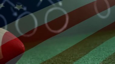 Deri Amerikan futbolu topu ile ön plan üzerinde Amerikan bayrağı closeup dijital bileşik