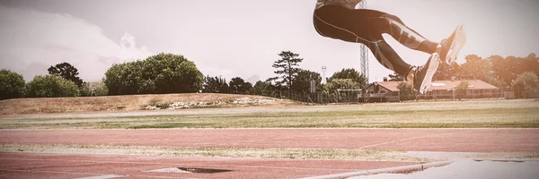 Athlete Performing Long Jump Competition — Stock Photo, Image