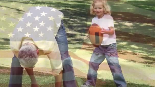 Compuesto Digital Abuelo Caucásico Jugando Fútbol Con Nieto Mientras Bandera — Vídeo de stock