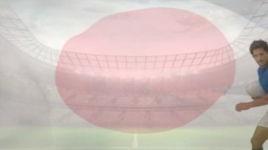 Afro-Amerikan rugby oyuncusu ve Japon bayrağı ön planda Futbol Stadyumu hareket tarafından ele süre futbol ile çalışan yakışıklı beyaz rugby oyuncusu dijital bileşik