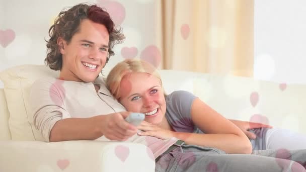 Front View Cute Caucasian Couple Sitting White Sofa While Harts — Stock Video