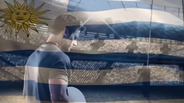 Digital Komposit Stilig Kaukasiska Rugbyspelare Med Fotboll Handen Medan Uruguayans — Stockvideo