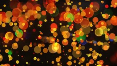 Siyah arka plana karşı renkli yanıp sönen bokeh efektinin dijital animasyonu