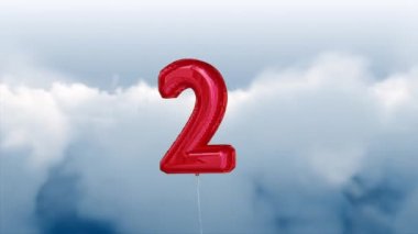 Bulutlu bir gökyüzüne karşı 2 numaralı şişme dijital kompozit