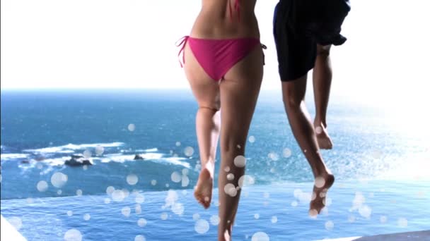 Digital Composite Young Caucasian Couple Jumping Swimming Pool Surrounded White — Stock Video