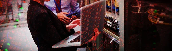Stocks Shares Technicians Using Laptop While Analyzing Server — Stock Photo, Image