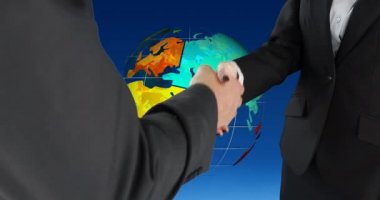 İş adamı ve iş kadını ve arka planda dönen bir dünya arasında bir el sıkışma dijital kompozit 4k