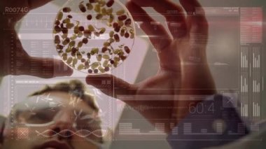 Bir petri kabı üzerinde fasulye eğitimi alan kafkas bir erkek bilim adamının dijital bileşimi ve ön planda çalışan istatistikler