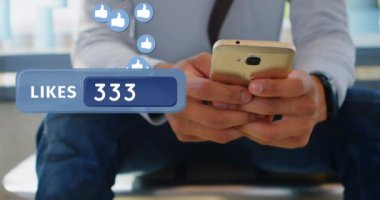 Telefonunda yazarken ofiste oturan bir çalışanın yakın. Onun yanında 4k yukarı uçan simgeler gibi sayısı artan gibi bir bar bir dijital animasyon