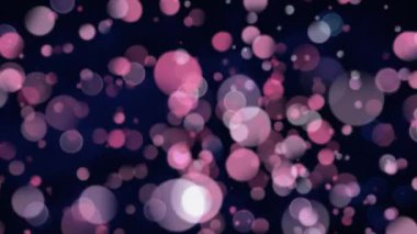 Renkli bokeh ışıklarının ekrana koyu bir arka planla yakınlaştırılması ve dışında dijital olarak oluşturulmuş animasyonu.
