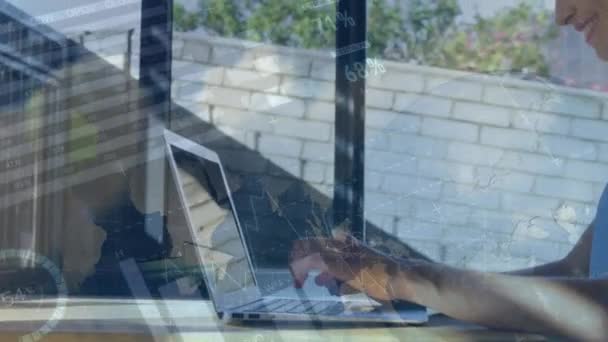 Digital Composite Woman Smiling While Using Laptop Graphs Moving Foreground — Stock Video