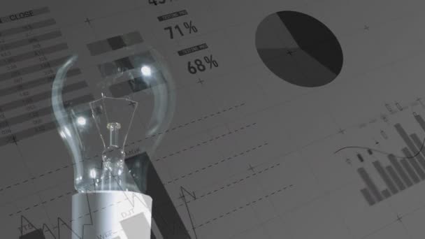 Composto Digital Uma Lâmpada Enquanto Fundo Mostra Diferentes Gráficos Movimento — Vídeo de Stock