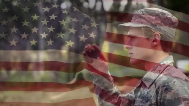 Digital Composite Military Man Saluting While Park American Flag Waving — Stock Video