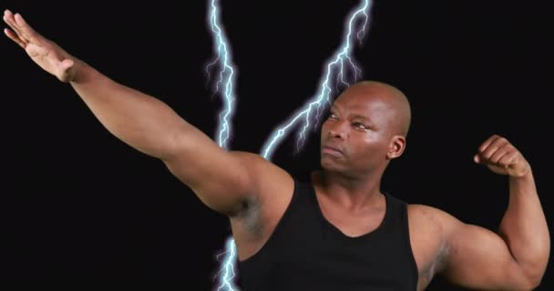 Close African American Male Bodybuilder Flexing His Biceps Digital Lightning — Stock Video