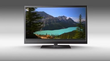Ekranında göl manzaralı düz ekran televizyonun dijital animasyonu