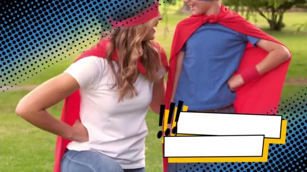 Close Caucasian Mother Her Son Wearing Superhero Costumes Park Digital — Stock Video