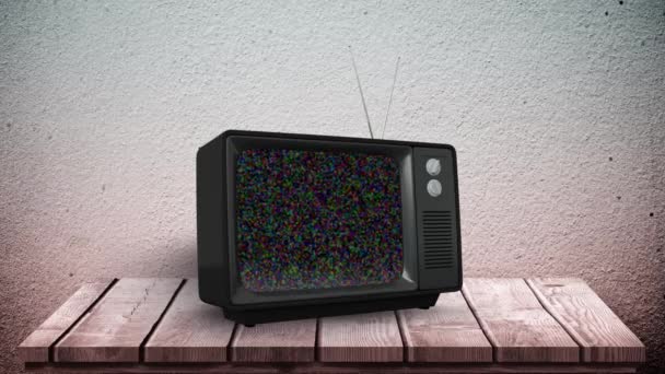 Ekranında Piksel Gürültüsü Olan Ahşap Bir Masaüzerindeki Televizyonun Dijital Animasyonu — Stok video