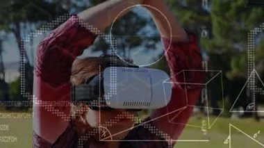 Ön planda şekil ve sayılarla açık havada meditasyon yaparken sanal gerçeklik kulaklık takan Beyaz bir kızın dijital kompoziti