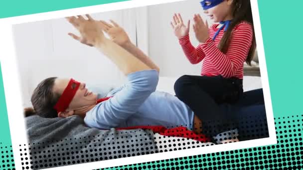 Close Mother Her Child Wearing Superhero Costumes Playing Mother Lying — Stock Video