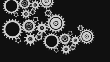Siyah arka planda dönen beyaz endüstriyel dişlilerin dijital animasyonu