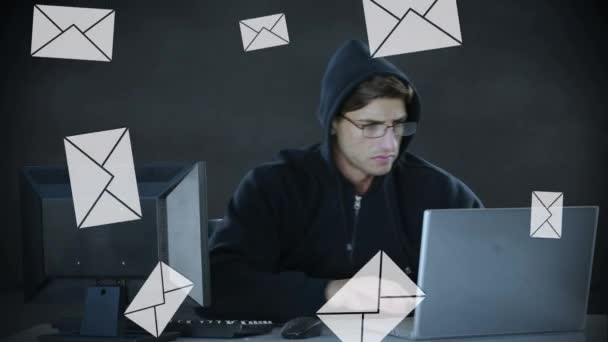 Digital Composite Male Caucasian Hacker Working Laptop Desktop Message Icons — Stock Video