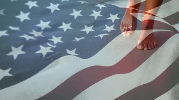 Digital Composite Walking Barefoot Beach American Flag Waving Foreground — Stock Video