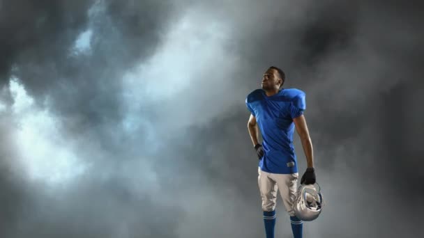 Digital Composite African American Football Player Holding His Helmet Background — Stock Video