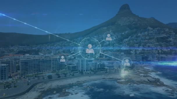 Animation numérique d'icônes de profil reliées par des lignes, avec vue sur une ville et une montagne 