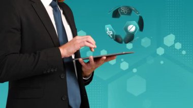 Mavi altıgen farklı tıbbi simgeler ekranda hareket eden altıgen desenleri ile mavi bir arka plan karşı dönen bir küre halinde düzenlenmiş ise bir tablet kullanarak takım elbiseli bir Kafkas işadamı dijital kompozit.