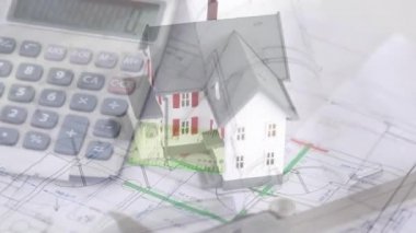 Planları ve planları ile bir 3d ev modeli dijital kompozit. Bir hesap makinesi ve taslak araçları ön planda görülür