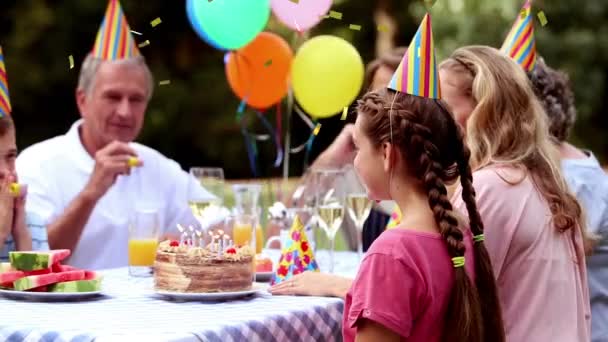 Digital Composite Caucasian Family Celebrating Birthday Outdoors While Gold Confetti — ストック動画