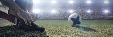 Rugby oyuncusu kalabalık futbol stadyumunun dijital görüntü karşı sahada ayakkabı bağcıkları bağlama