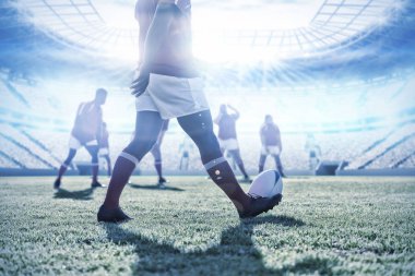 Futbol stadyumuna karşı sahada çeşitli rugby oyuncuları