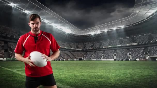 Animation Caucasian Male Rugby Player Playing Ball Looking Camera Floodlit — Stock Video