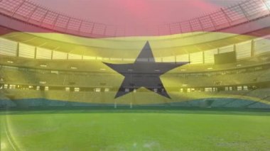Bir spor stadyumu önünde Gana bir üfleme bayrağı animasyon