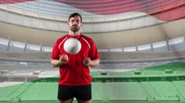 Bir top ile oynayan ve arka planda Macar bayrağı ve stadyum üfleme ile kameraya bakarak bir Kafkas erkek rugby oyuncusu animasyon