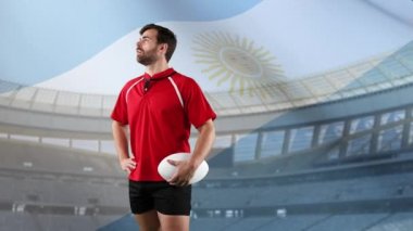 Bir top tutan ve arka planda Arjantin bayrağı ve stadyum üfleme ile etrafa bakan bir Kafkas erkek rugby oyuncusu animasyon