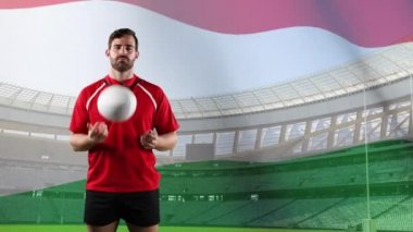 Bir top ile oynayan ve arka planda Macar bayrağı ve stadyum üfleme ile kameraya bakarak bir Kafkas erkek rugby oyuncusu animasyon
