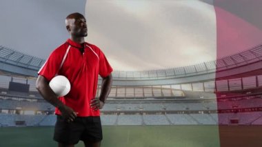 Bir Afro-Amerikan erkek rugby oyuncusu bir top tutan ve arka planda Fransız bayrağı ve stadyum üfleme ile etrafa bakarak Animasyon